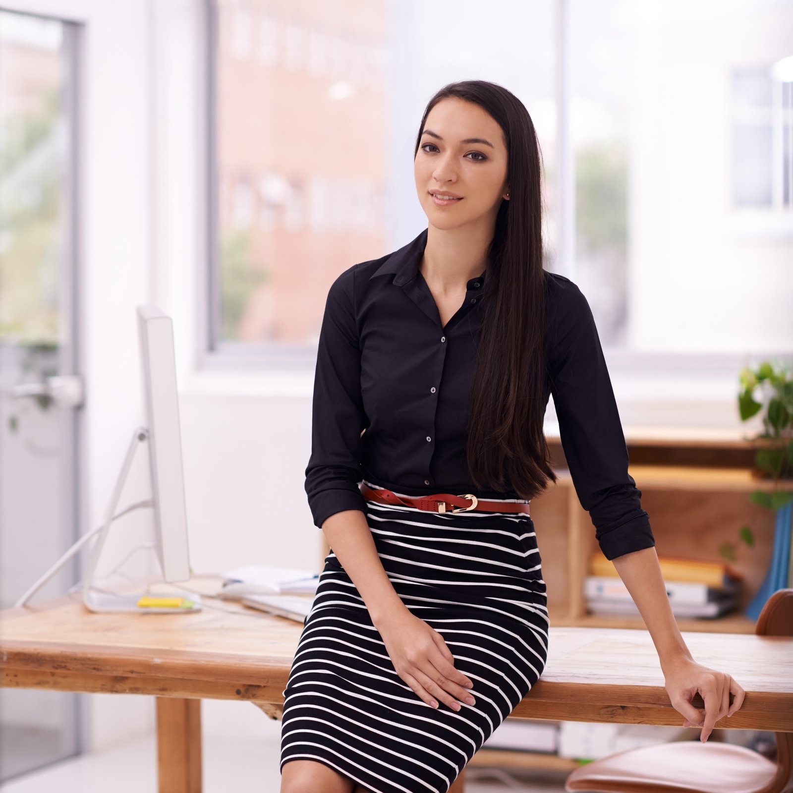 living in a corporate world shot of a young businesswoman in her office